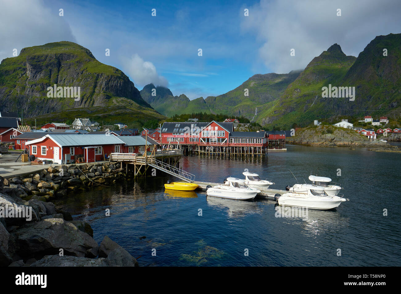 The traditional Norwegian buildings and landscape of the small fishing village and port of Å on Moskenesøya, Lofoten islands Norway Stock Photo