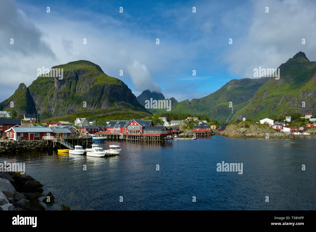 The traditional Norwegian buildings and landscape of the small fishing village and port of Å on Moskenesøya, Lofoten islands Norway Stock Photo