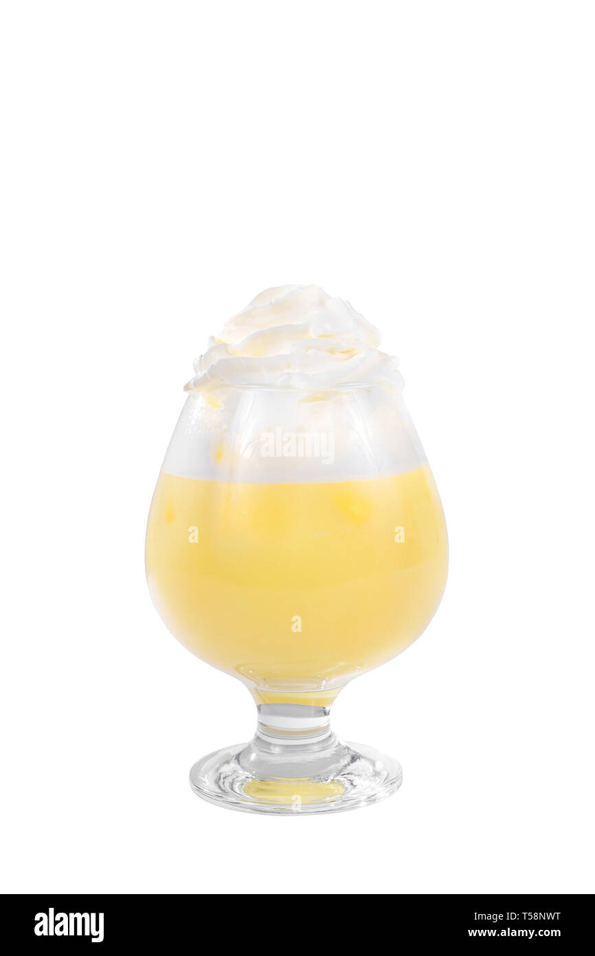 Pina colada, yellow creamy cocktail in a high glass with crushed ice