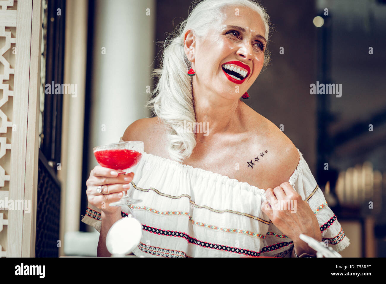 Beautiful mature woman tattoo hi-res stock photography and images - Alamy