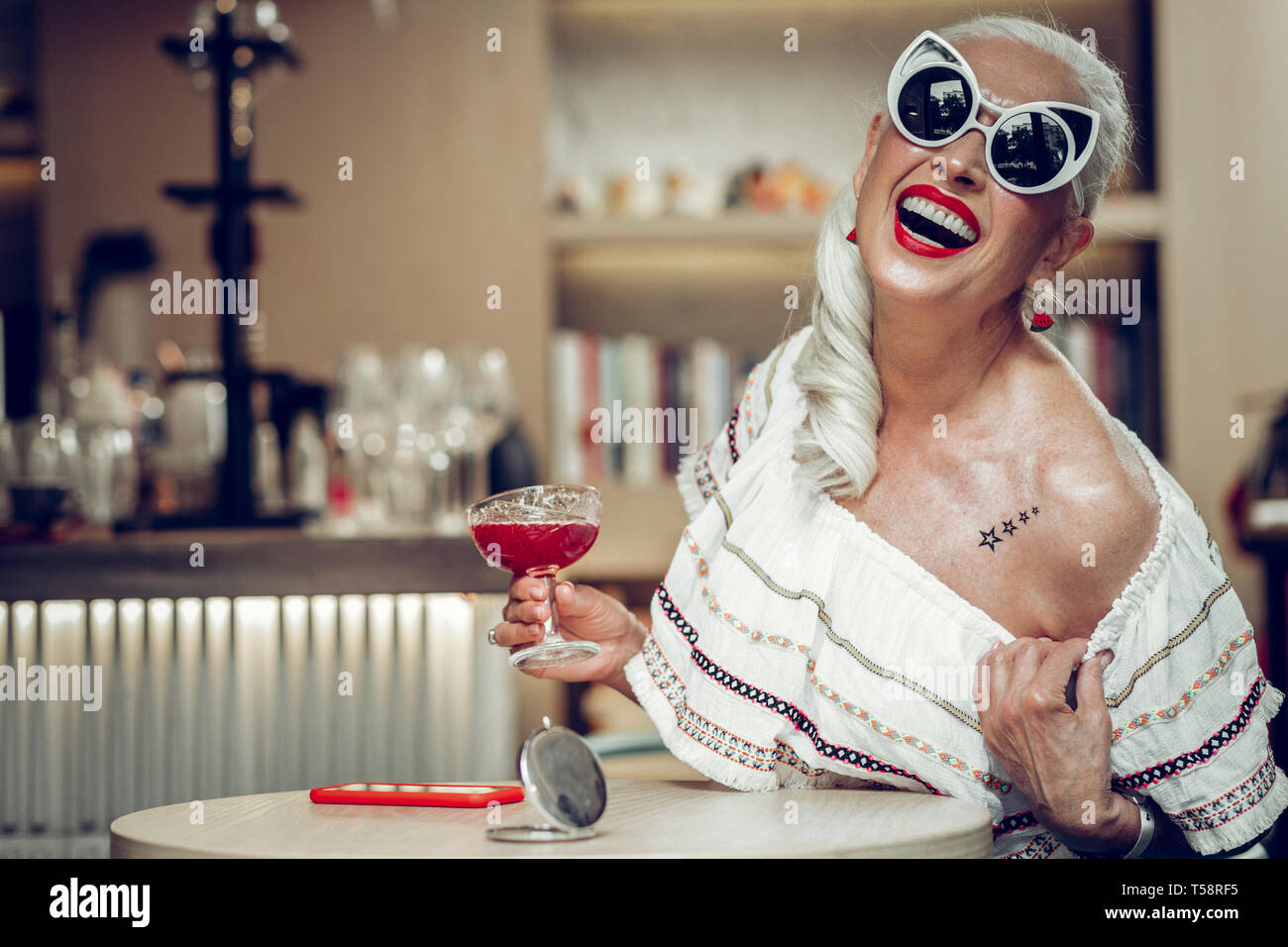 Beautiful mature woman tattoo hi-res stock photography and images - Alamy