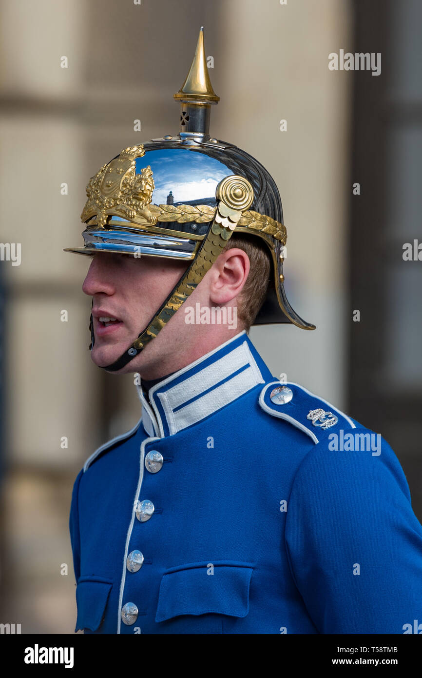 A Royal Swedish Life Guard in his light blue ceremonial uniform and decorated silver pickelhaube helmet.. Stock Photo
