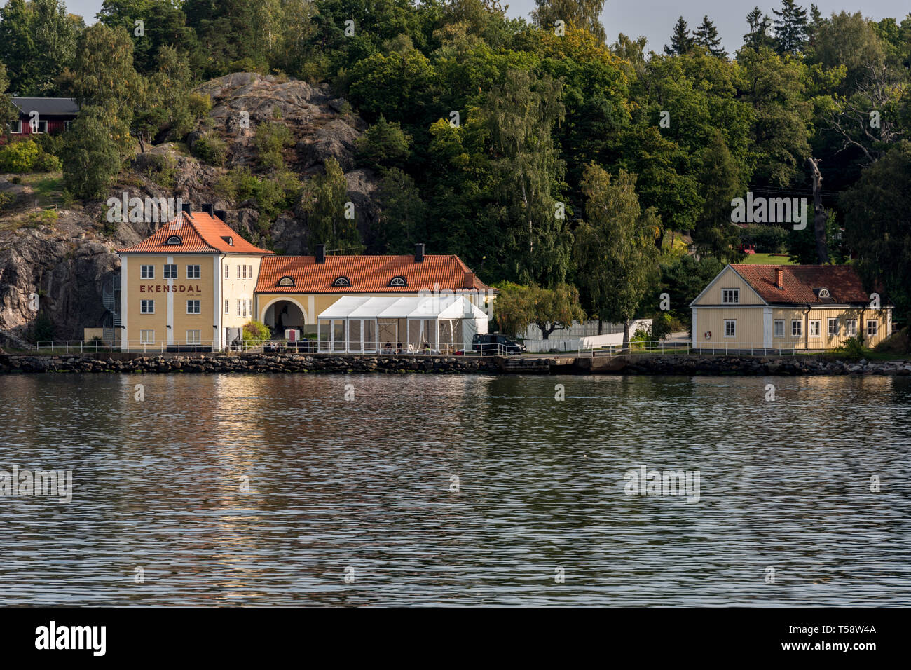 Ekensdal, the colourful former tar factory and one-time summer residence is now a restaurant, conference centre and wedding venue on Nacka, Stockholm Stock Photo