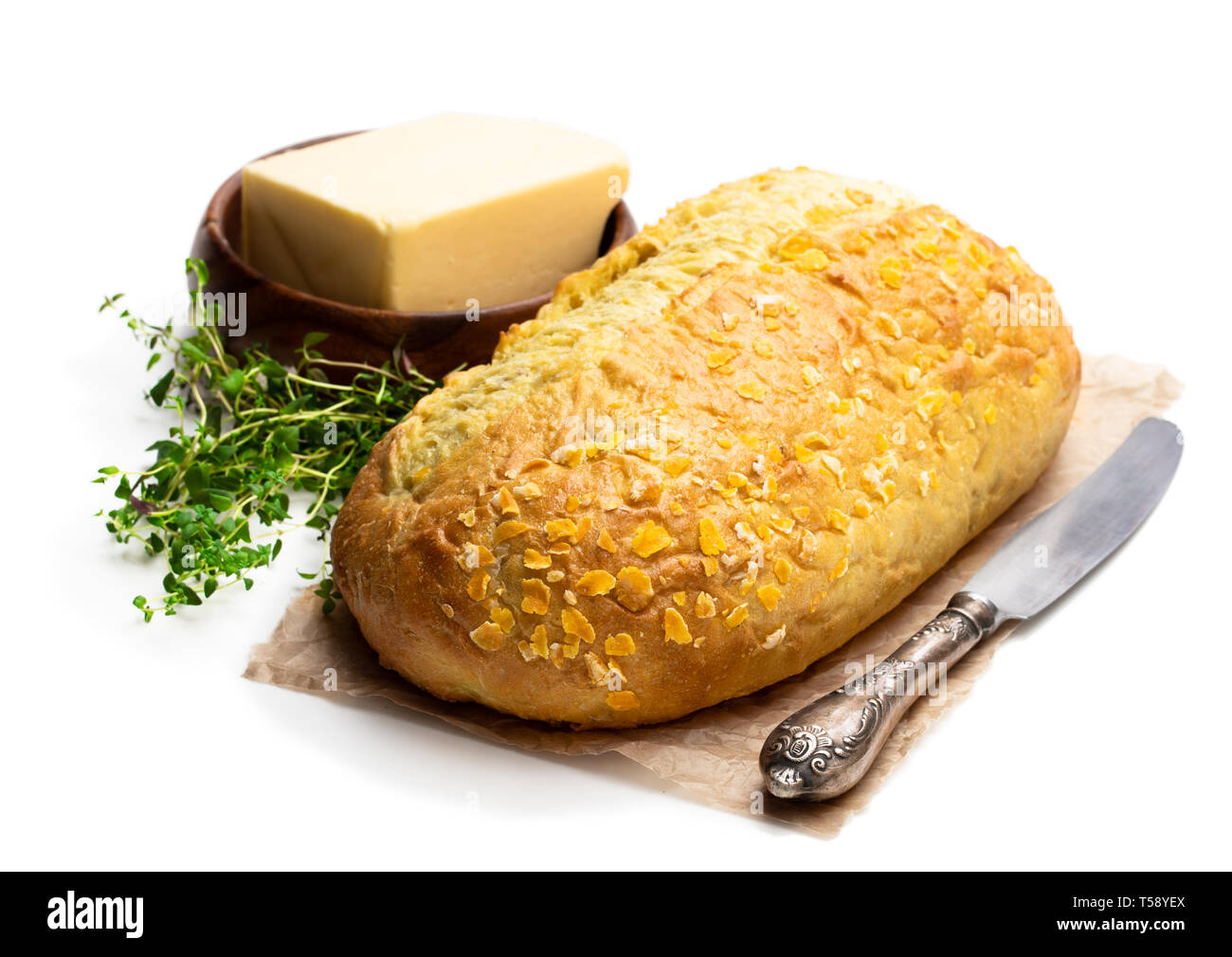 Homemade  corn loaf with butter isolated on white Stock Photo