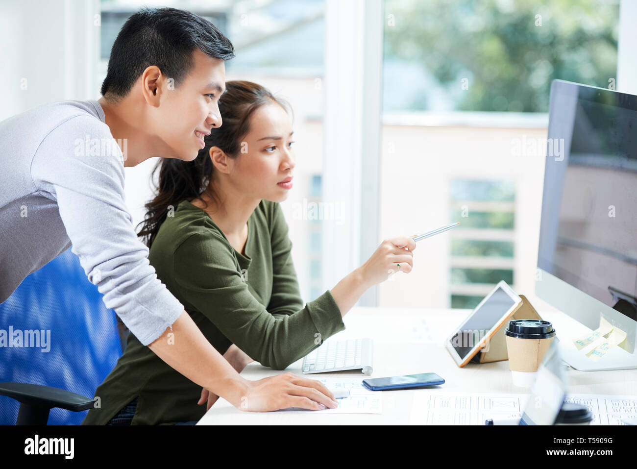 Discussing user experience design Stock Photo