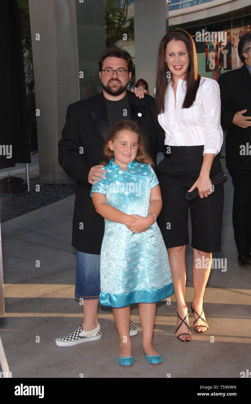 LOS ANGELES, CA. July 11, 2006: Director/actor KEVIN SMITH & wife actress JENNIFER SCHWALBACH SMITH & daughter at the Los Angeles premiere of his new movie 'Clerks II'. © 2006 Paul Smith / Featureflash Stock Photo