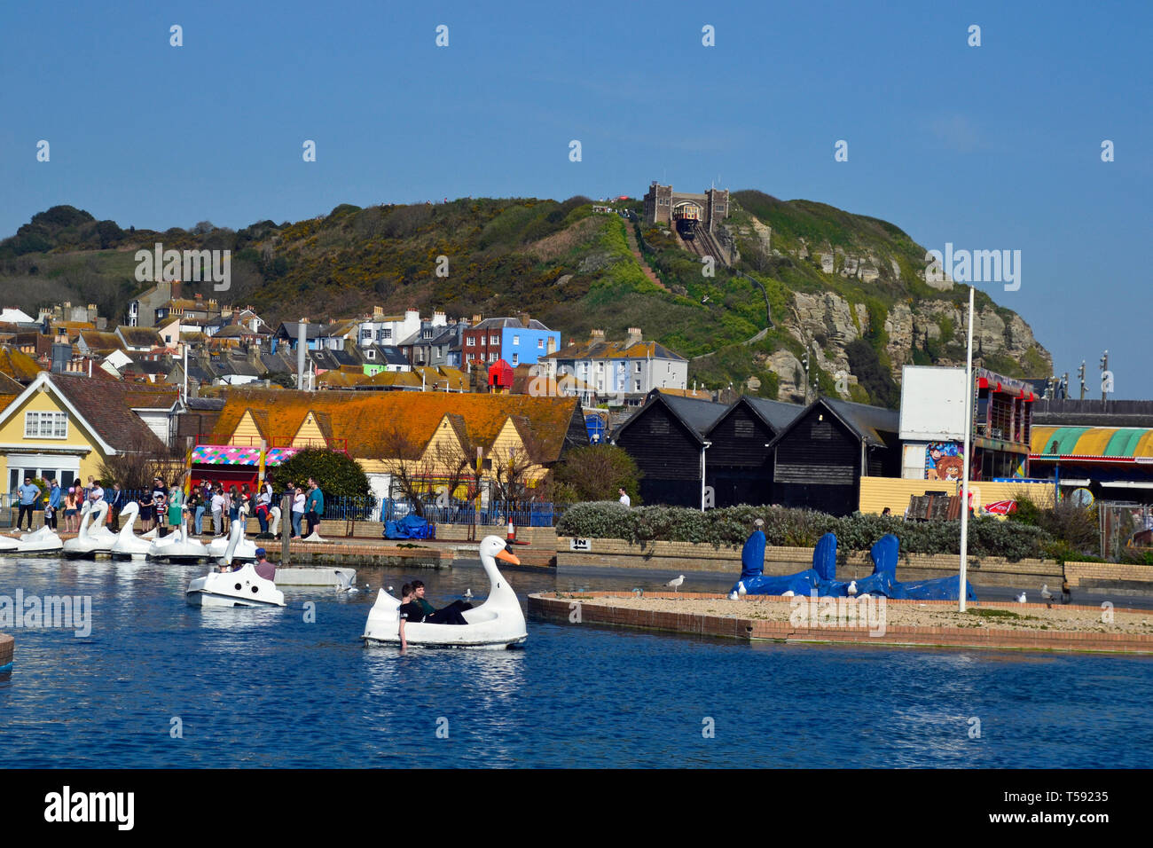 The Old Town Boating Lake with swan pedalos in Hastings, East Sussex, UK Stock Photo