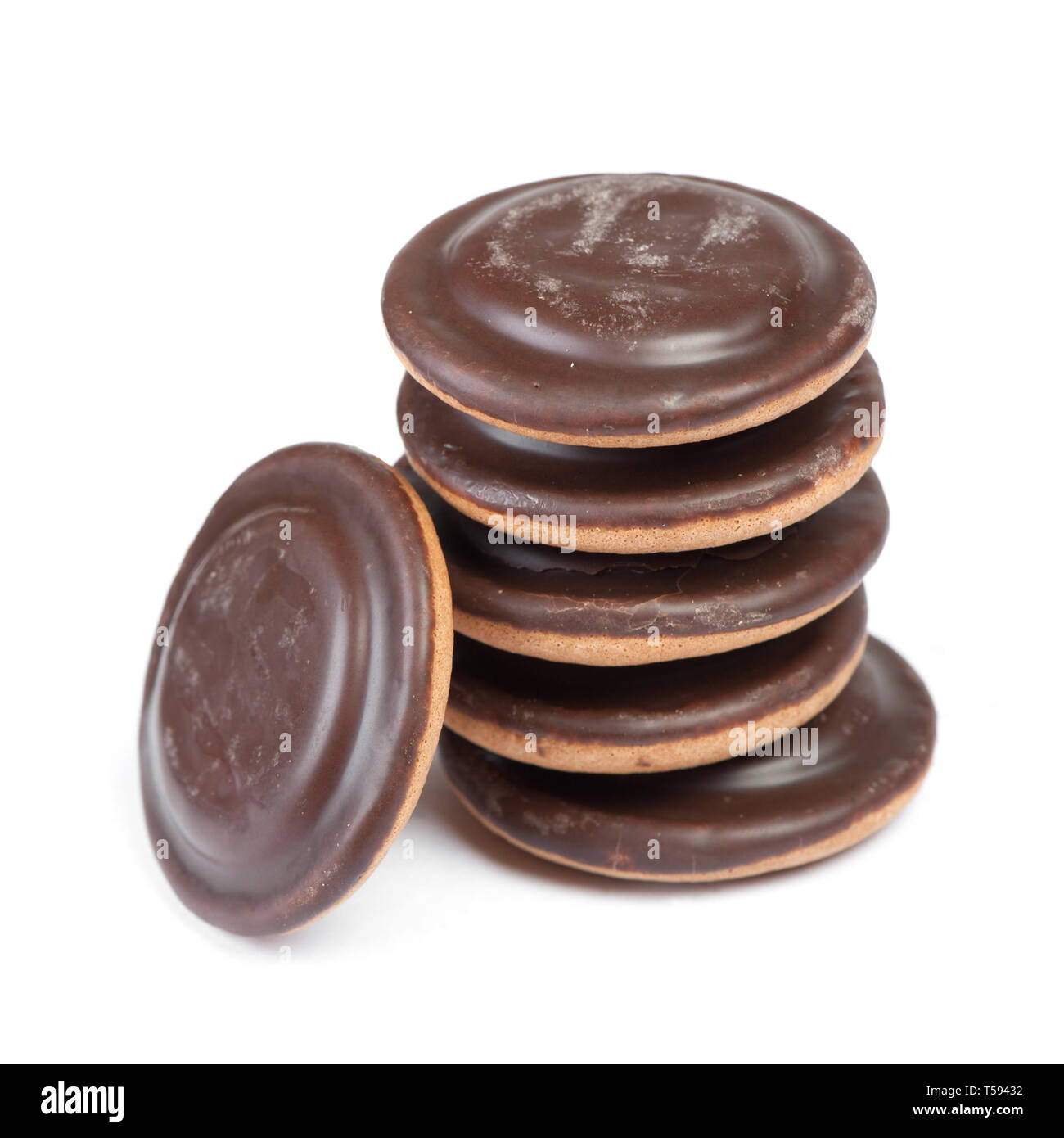 Group of round delicious glazed chocolate chip cookies with jam inside