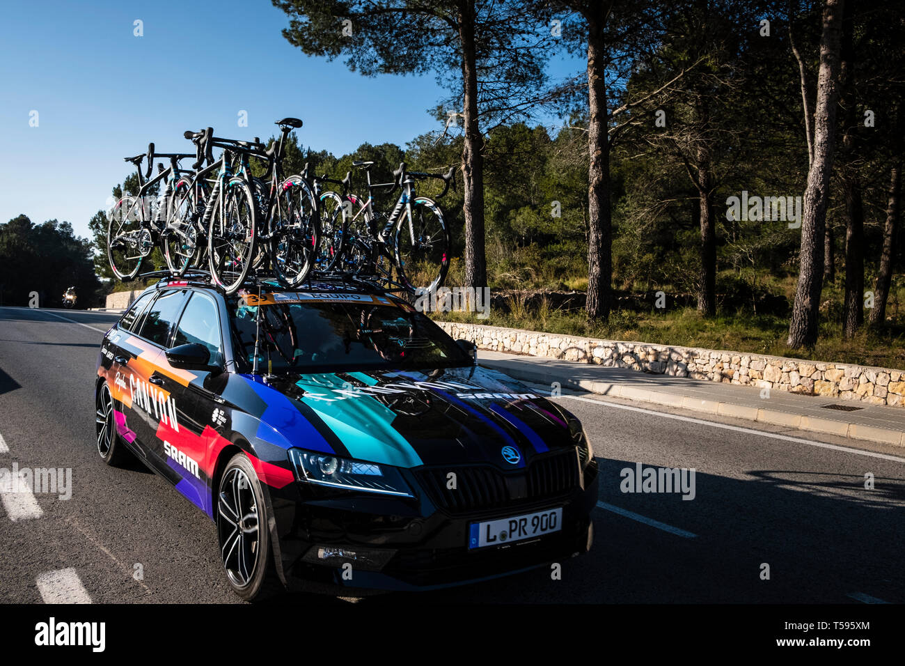 Woman's Cycle race support vehicles La Safor mountains near Gandia Spain Stock Photo