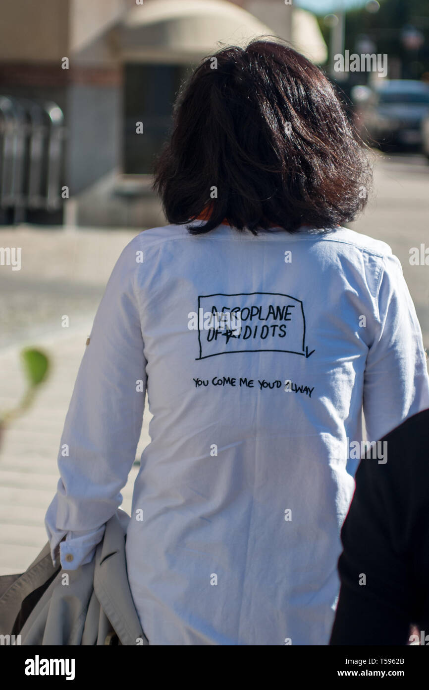Unintelligible English seen on the t-shirt of a tourist in Stockholm Stock Photo