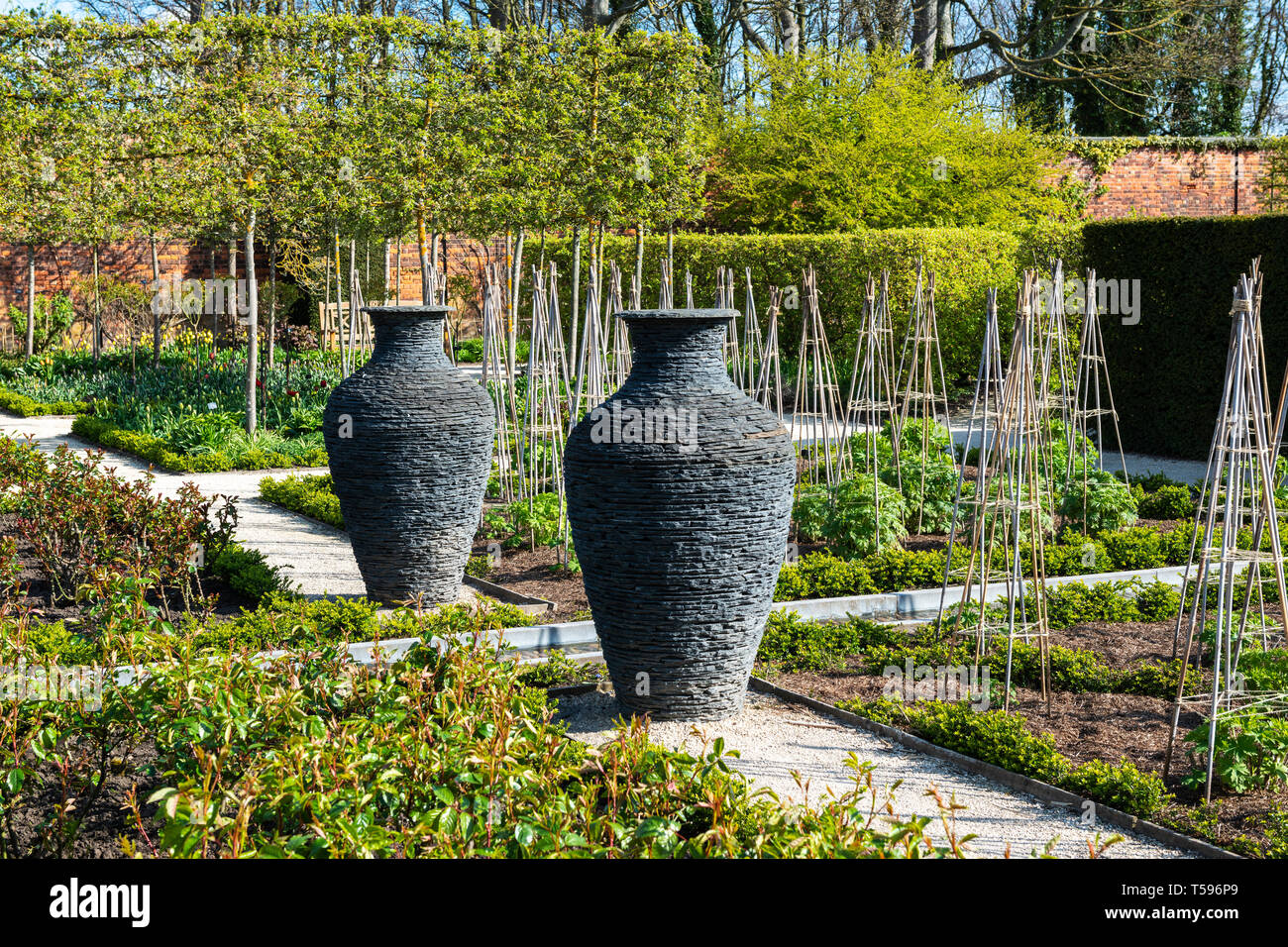 Slate pots in Ornamental Garden at Alnwick Garden, Alnwick, Northumberland, England, UK Stock Photo