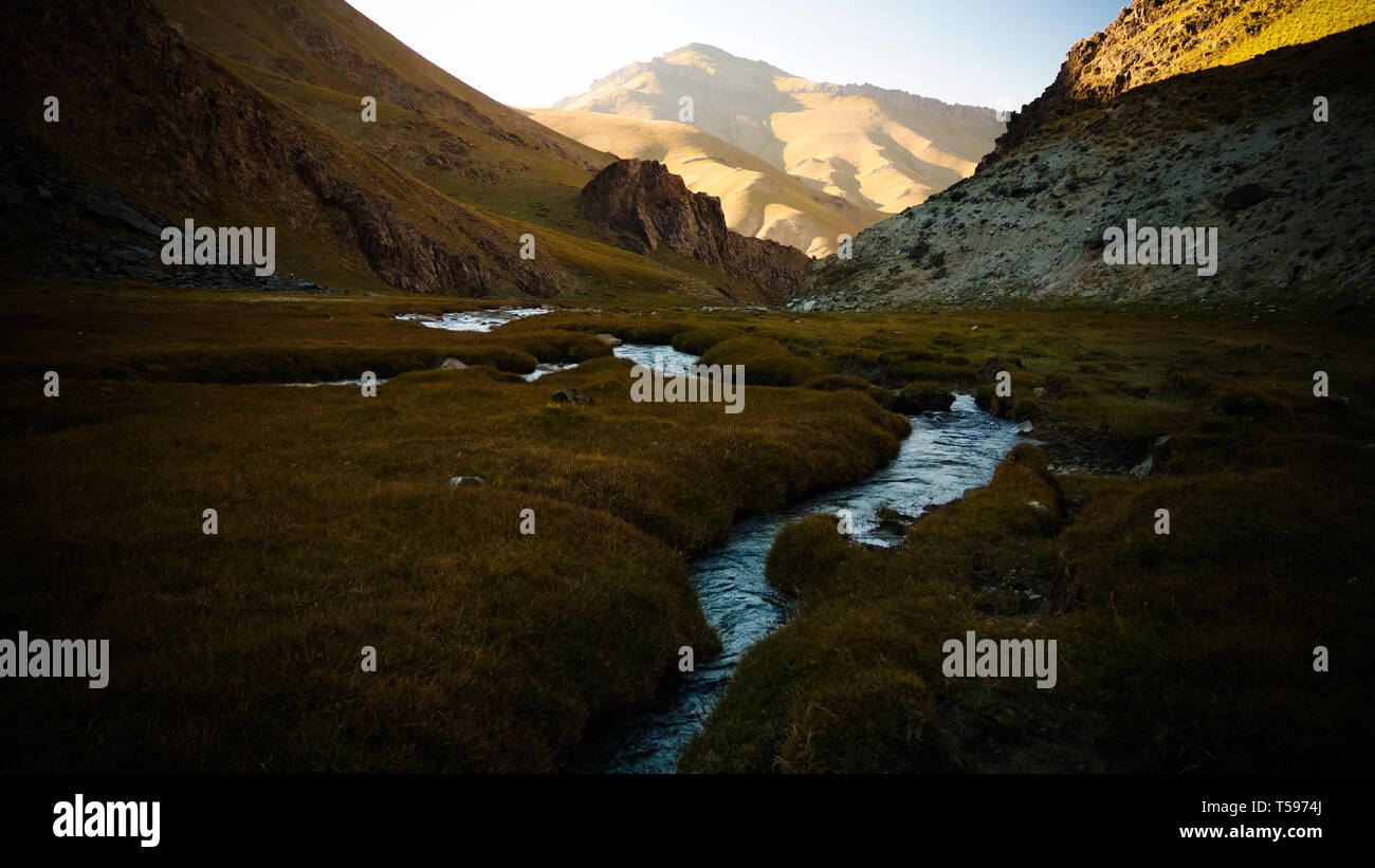 Sunset view to Tash-Rabat river and valley , Naryn province, Kyrgyzstan Stock Photo