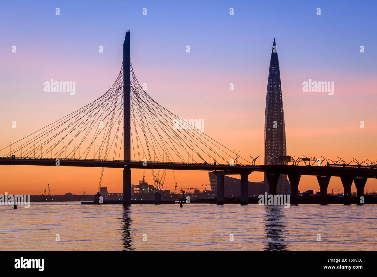 Sunset in Lahta. Neva river and modern bridge and tower of Saint-Petersburg, Russia. Stock Photo