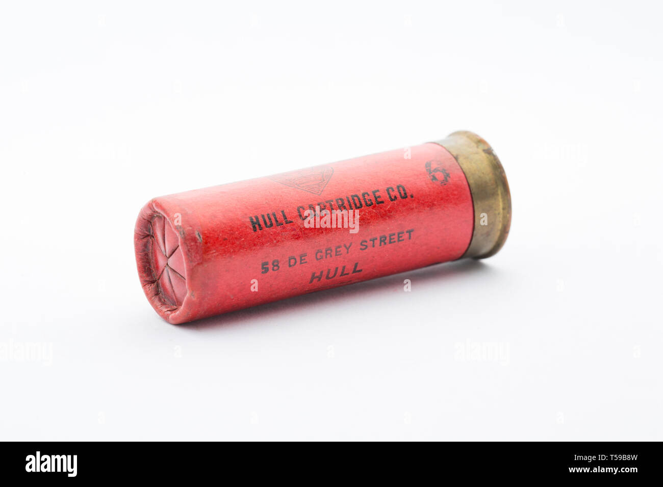 A Hull Cartridge Co. 12 gauge paper case shotgun cartridge with a crimped closure loaded wit No 6 lead shot pellets. Collecting shotgun cartridges is  Stock Photo