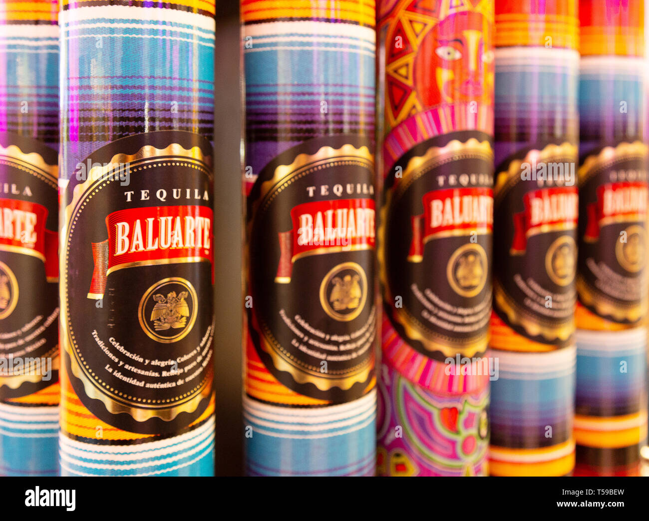 Close up of bottles of Baluarte Tequila on the shelf, Cancun Mexico Stock Photo