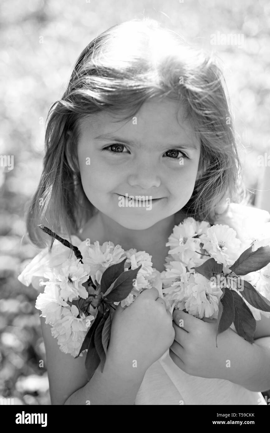This is my best summer holiday ever. Springtime. Little girl in sunny spring. face and skincare. allergy to flowers. Summer girl fashion. Happy Stock Photo