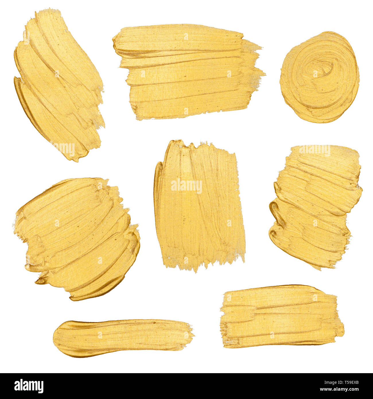 Gold paint stokes isolated on white background Stock Photo