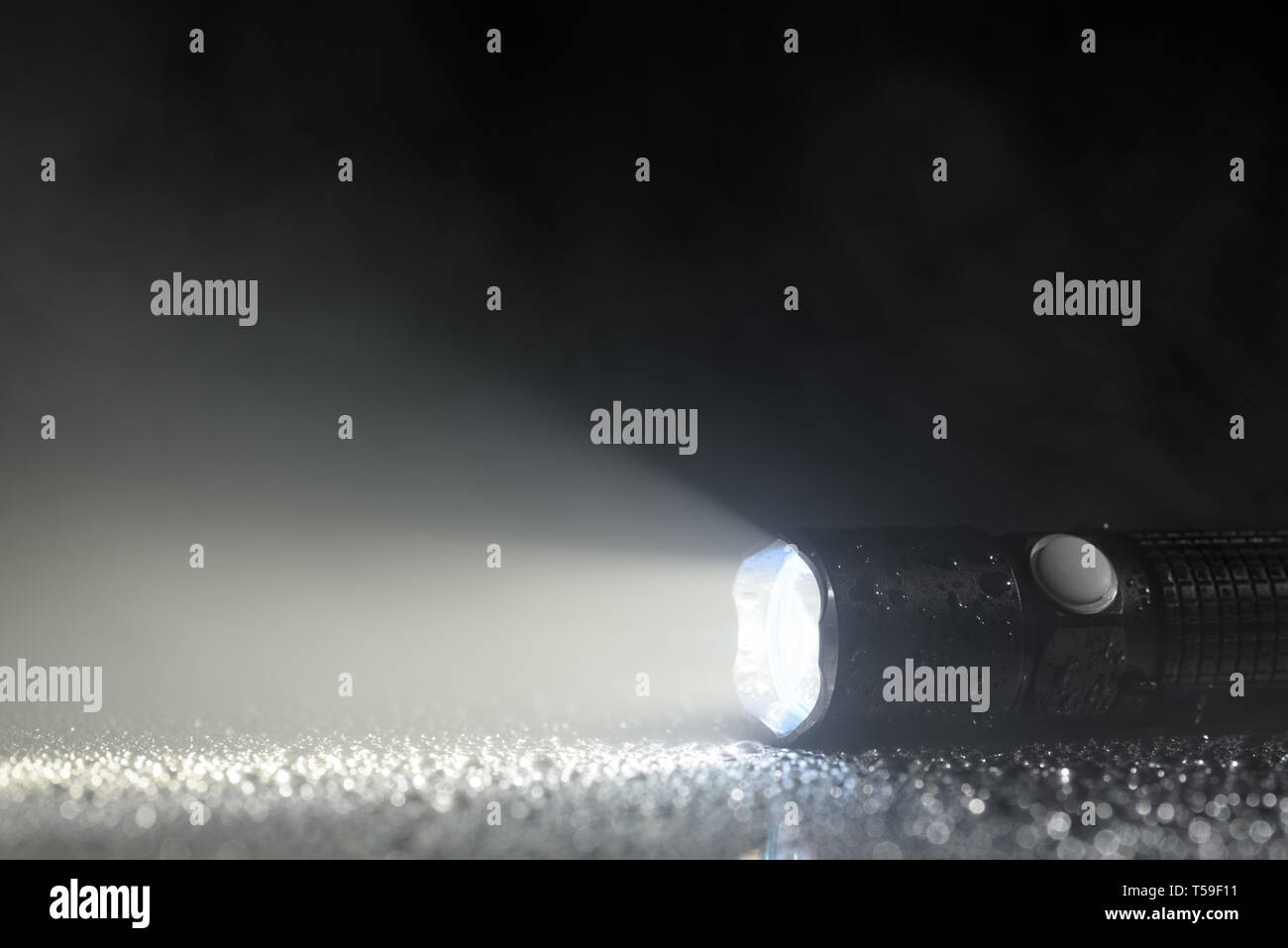 Tactical flashlight Stock Photo