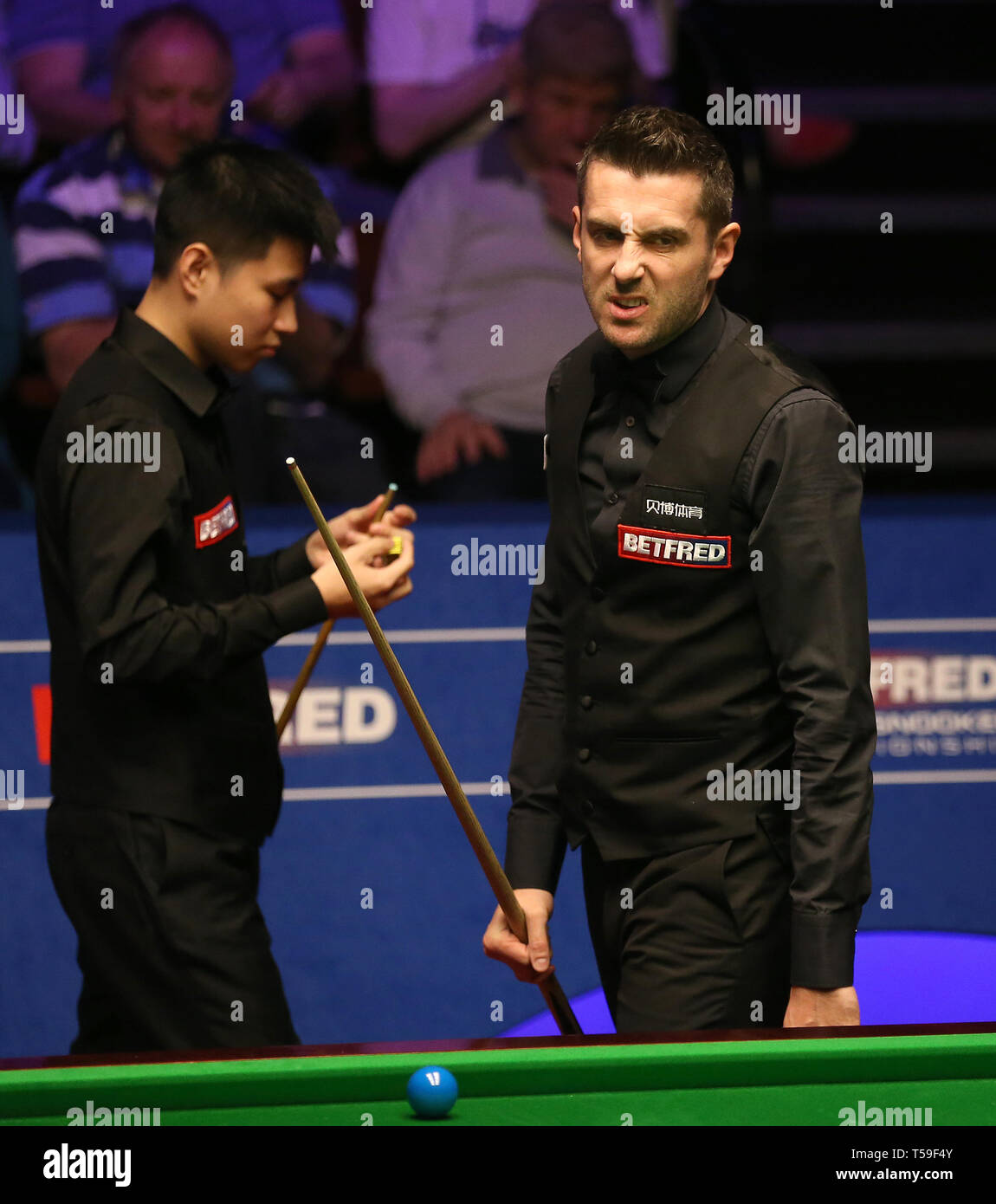 Mark Selby Right During His Game Against Zhao Xintong During Day Three Of The 2019 Betfred World Championship At The Crucible Sheffield Stock Photo Alamy