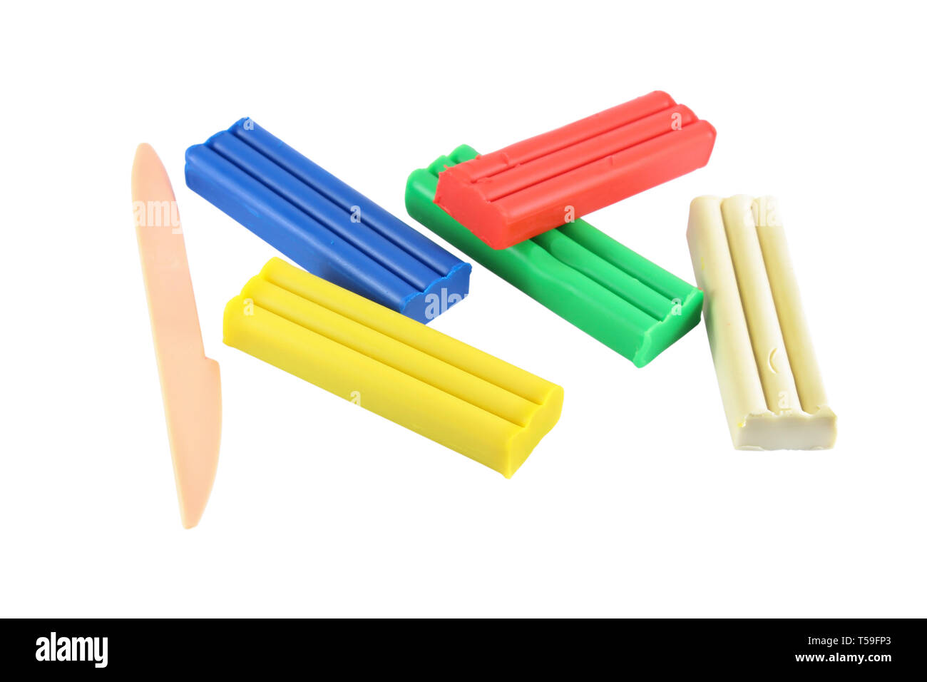 Children set of colored pieces of plasticine and a plastic knife for sculpting Stock Photo