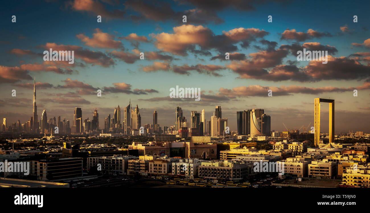 UAE skyline with Burj Khalifa and the new Dubai Frame in one shot, Downtown, Tallest building on earth, Sheikh Zayed road in view, beautiful clouds Stock Photo