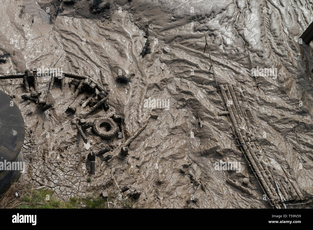 Abstract patterns and debris in the muddy banks of The River Usk, Newport, South Wales, UK viewed from the CitiesTransporter Bridge. Stock Photo