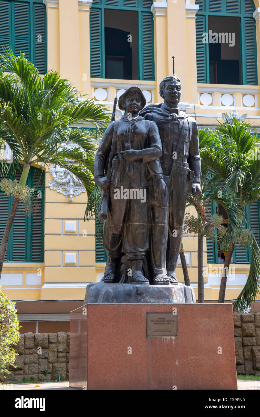 Statue of Viet Cong revolutionary soldiers outside General Post Office in Ho Chi  Minh City, or Saigon, Vietnam. Stock Photo