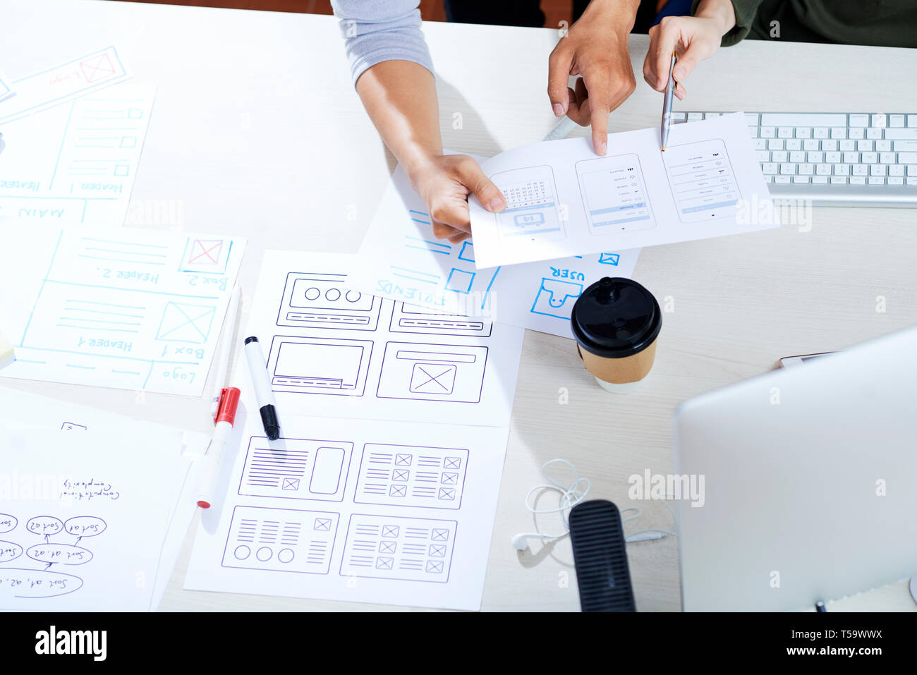 Discussing ux design for mobile app Stock Photo