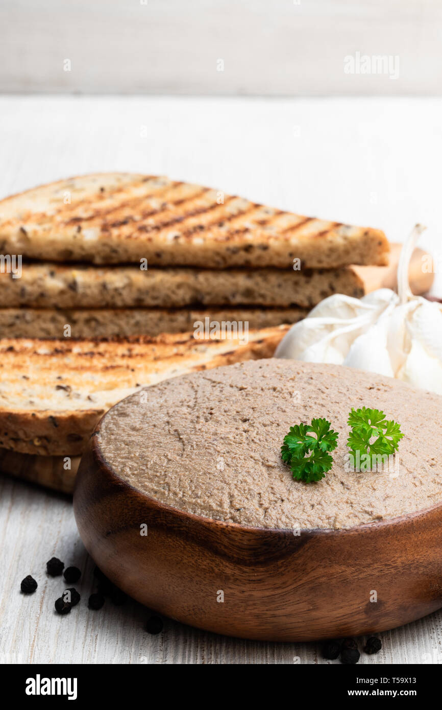 Fresh pate with toasted bread on white table Stock Photo Alamy