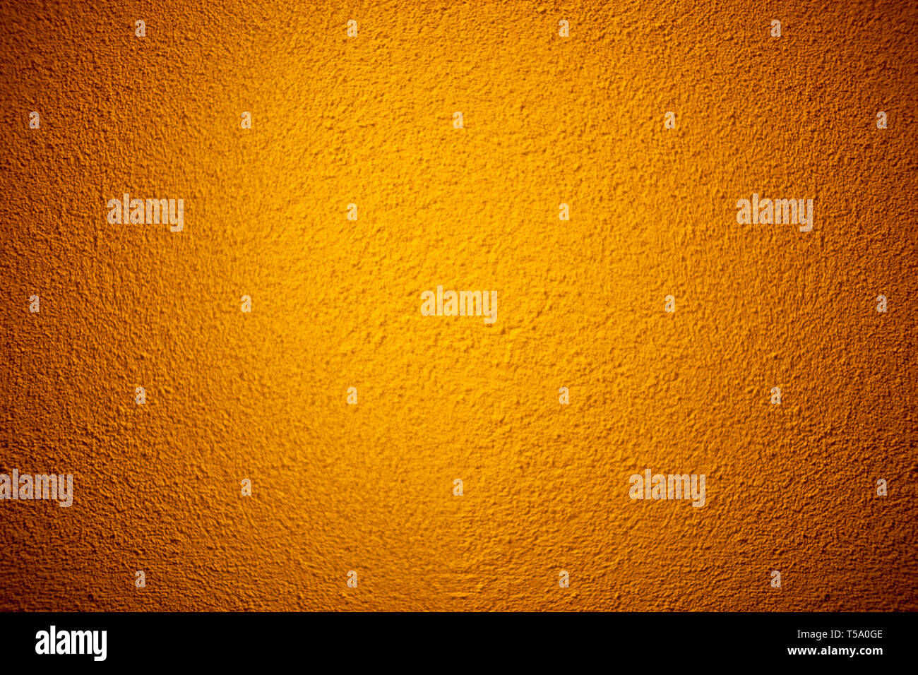 Orange color grunge cement wall texture background Stock Photo