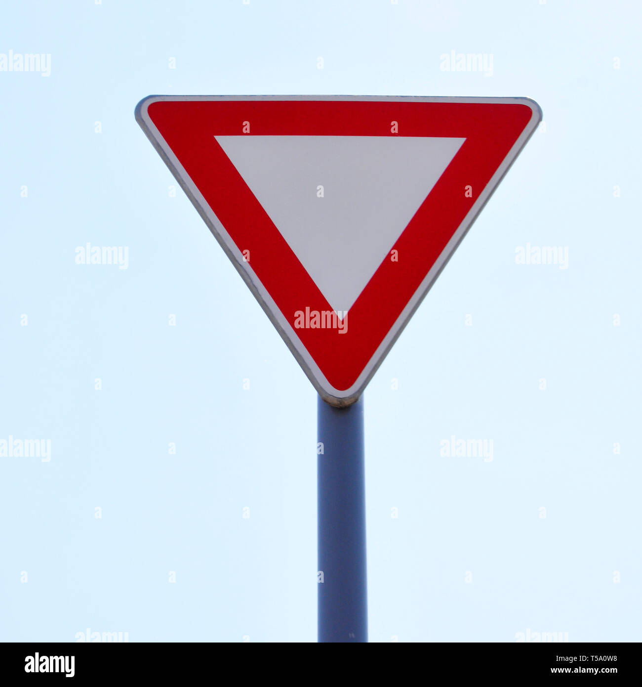 Traffic Sign In The Form Of A White Triangle Give Way Stock Photo Alamy