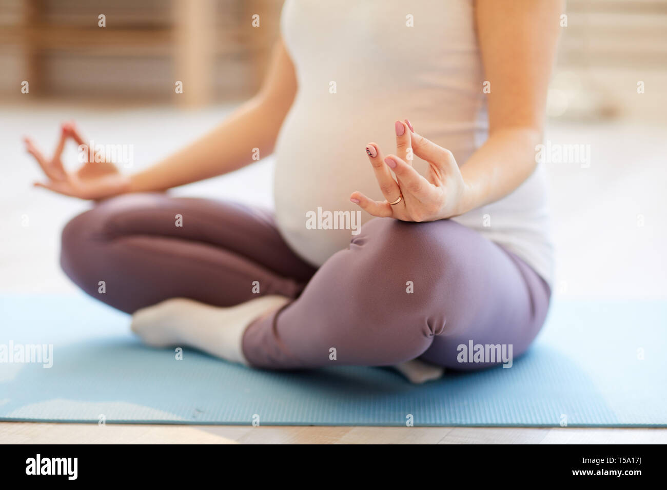 Pregnant Woman Meditating Closeup Stock Photo