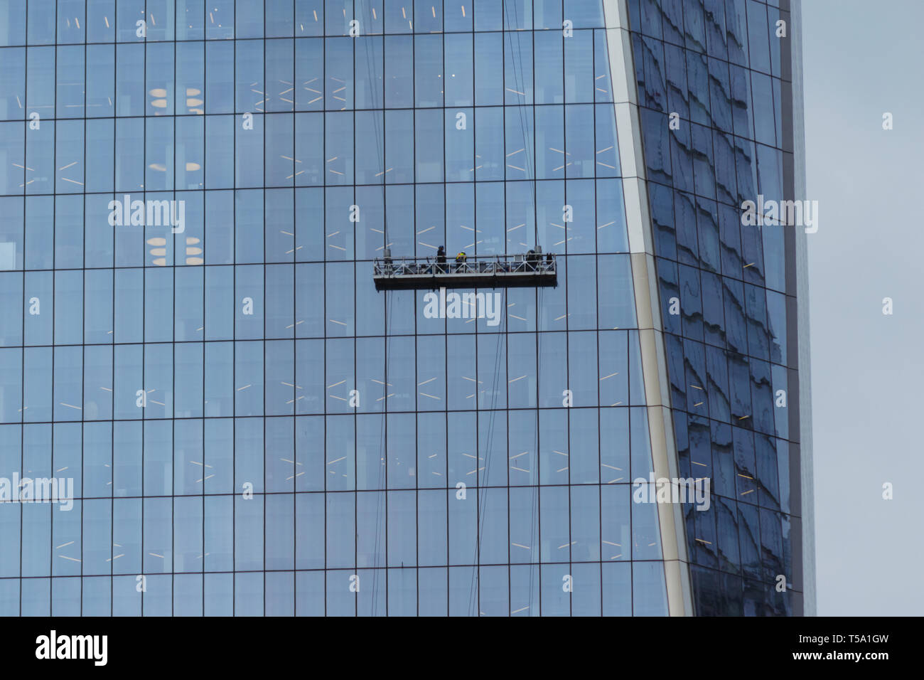 Window washers cleaning the facade of Liberty tower Stock Photo