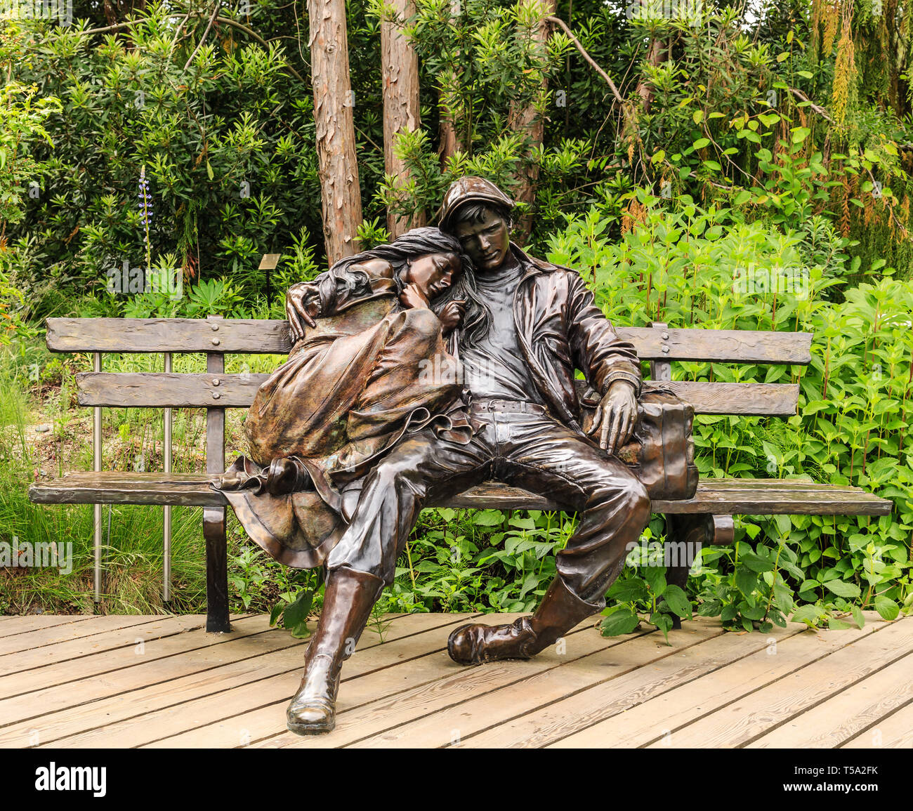 Statues on Bench Stock Photo Alamy