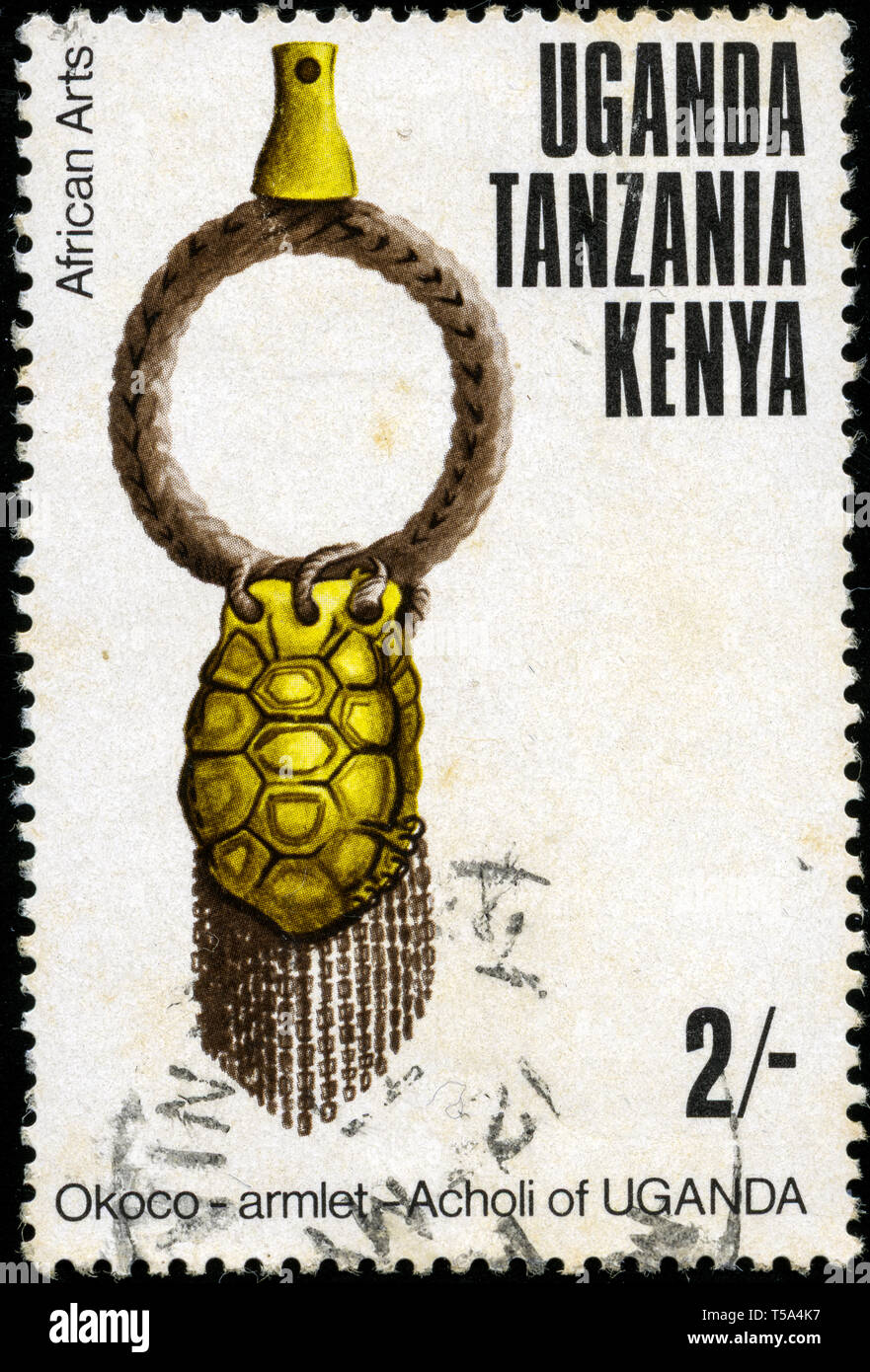 Postage stamp from British East Africa (Kenya, Uganda, Tanganika) in the African Arts series issued in 1975 Stock Photo