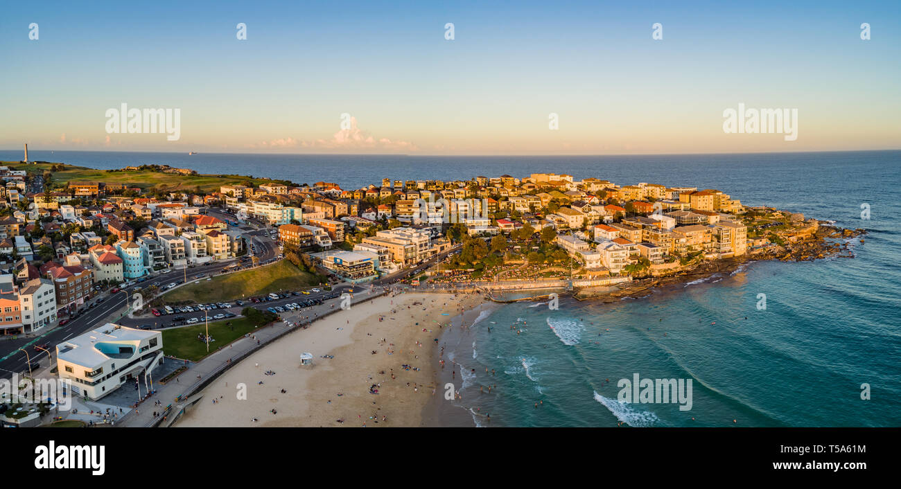 Bondi Beach Drone Shot at Sunset with Sydney CBD in background at Sunset Stock Photo