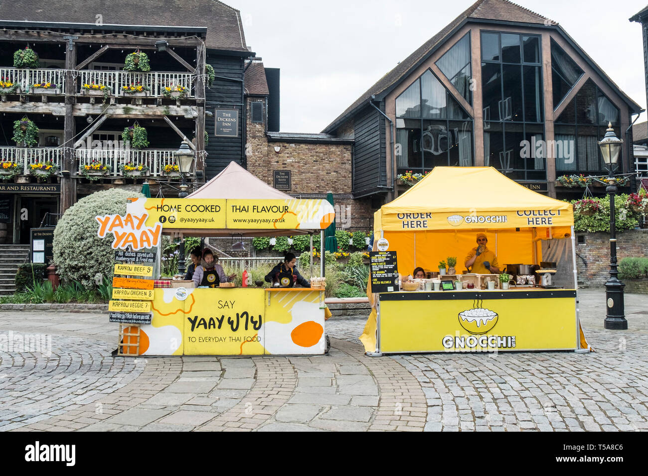 Food stalls at a Street Food Festival in St Katherine Katherines Dock in  Wapping in London Stock Photo
