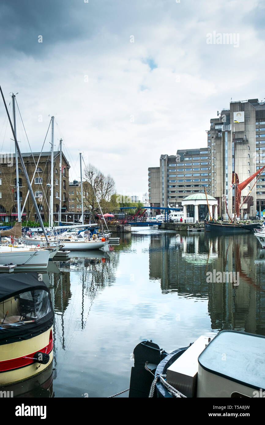 Boats and houseboats moored in St Katherine Dock St Katherines Dock in