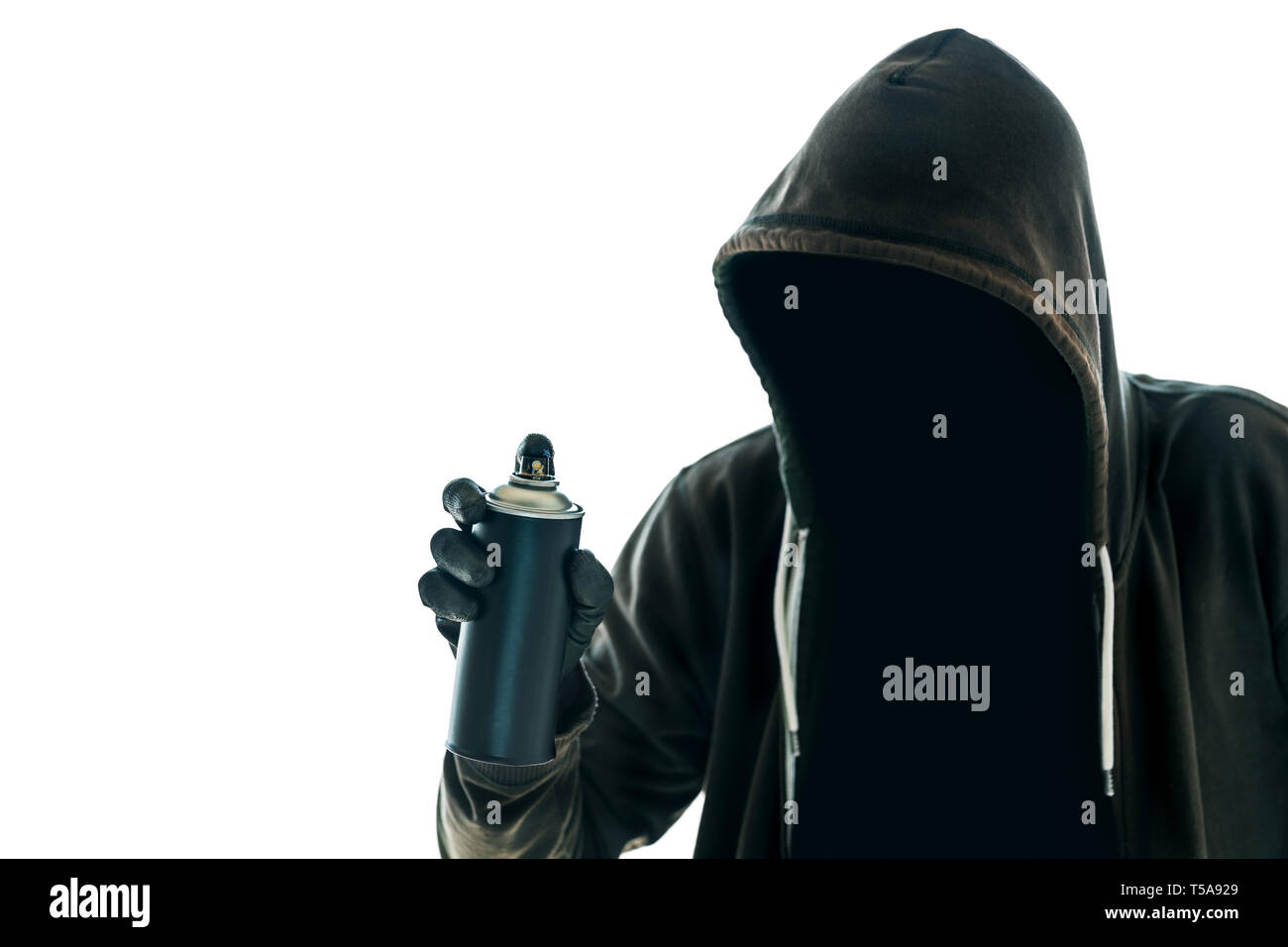 Hooded graffiti artist with spray paint can isolated on white background Stock Photo