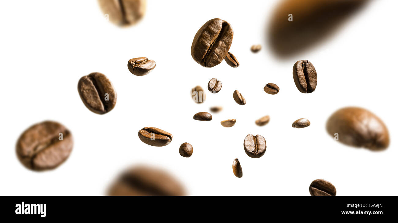 Coffee beans in flight on white background Stock Photo Alamy