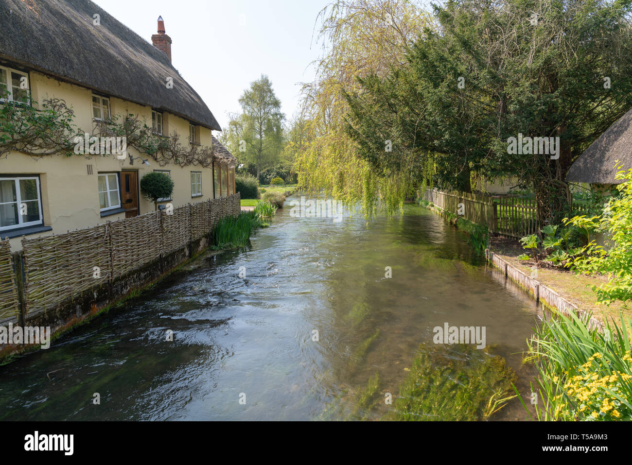River Test running through the beautifully classic English village of ...