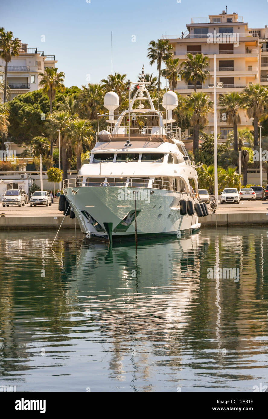 CANNES, FRANCE - APRIL 2019: Luxury motor cruiser berthed in the Port