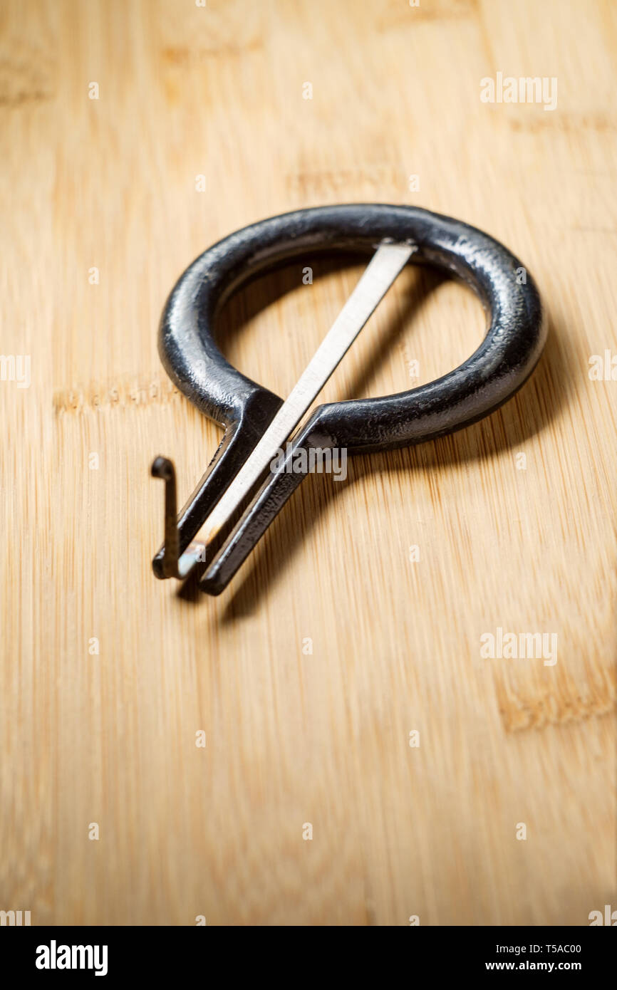 Metal musical instrument called the jaw mouth ozark or juice harp Stock