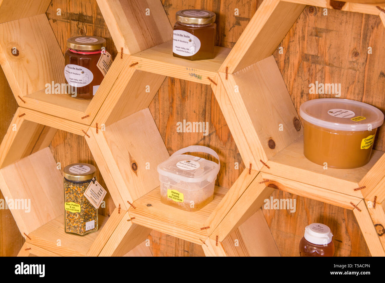 Maple Valley, Washington, USA. A variety (honey, creamed honey, bee pollen, of bee
