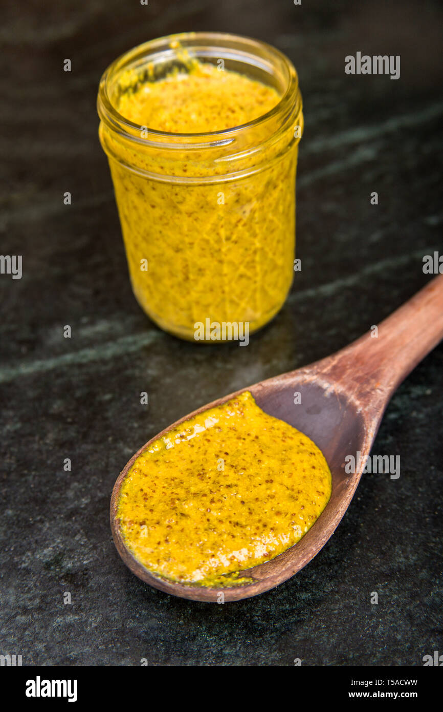 Home-canned yellow mustard Stock Photo