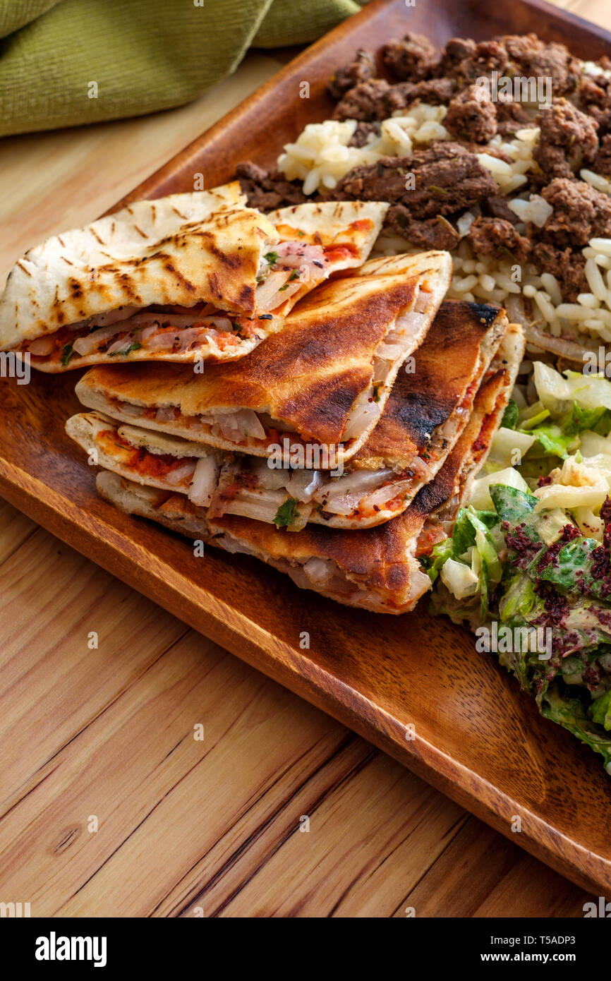 Authentic Middle Eastern veal Shawarma platter with vegetable ara'yes