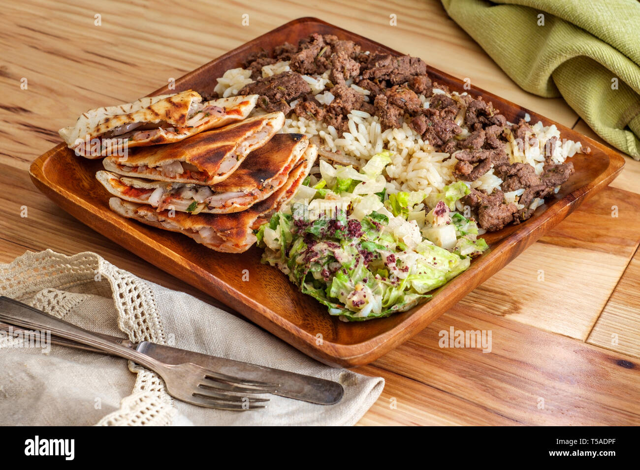 Authentic Middle Eastern veal Shawarma platter with vegetable ara'yes