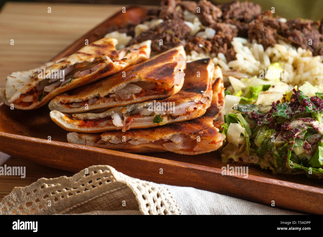 Authentic Middle Eastern veal Shawarma platter with vegetable ara'yes