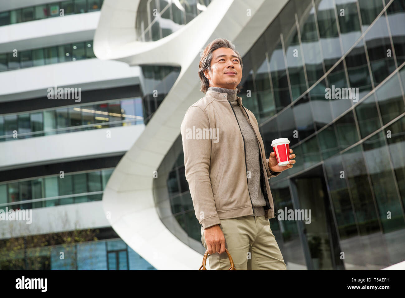 Confident business man Stock Photo - Alamy