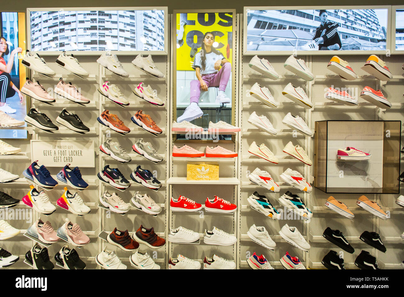 Sneakers industry worth more than a billion dollars in 2018, Nike shoes on display selling in Foot Locker store, Singapore Stock Photo